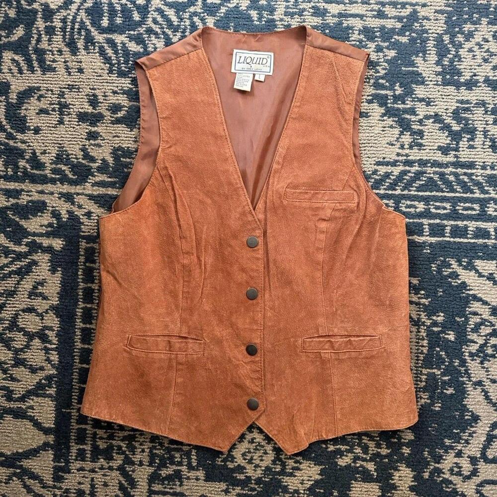 The Liquid By Erez Leyy Brown Suede Western Vest is a stylish and classic piece